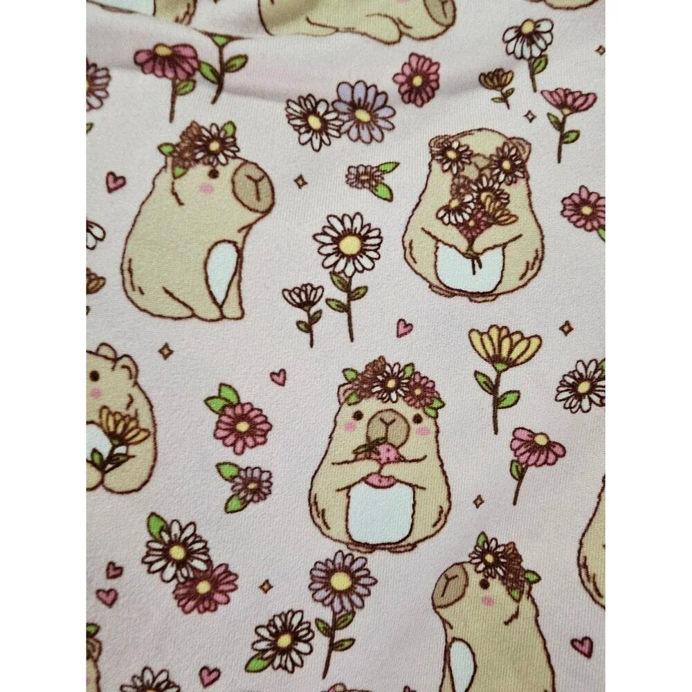 Penelope Mack,  pink capybaras and floral Pjs